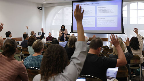Siya Raj Purohit presents to an actively participating audience at SDSU's AI in the Classroom roundtable, discussing educational uses of ChatGPT.